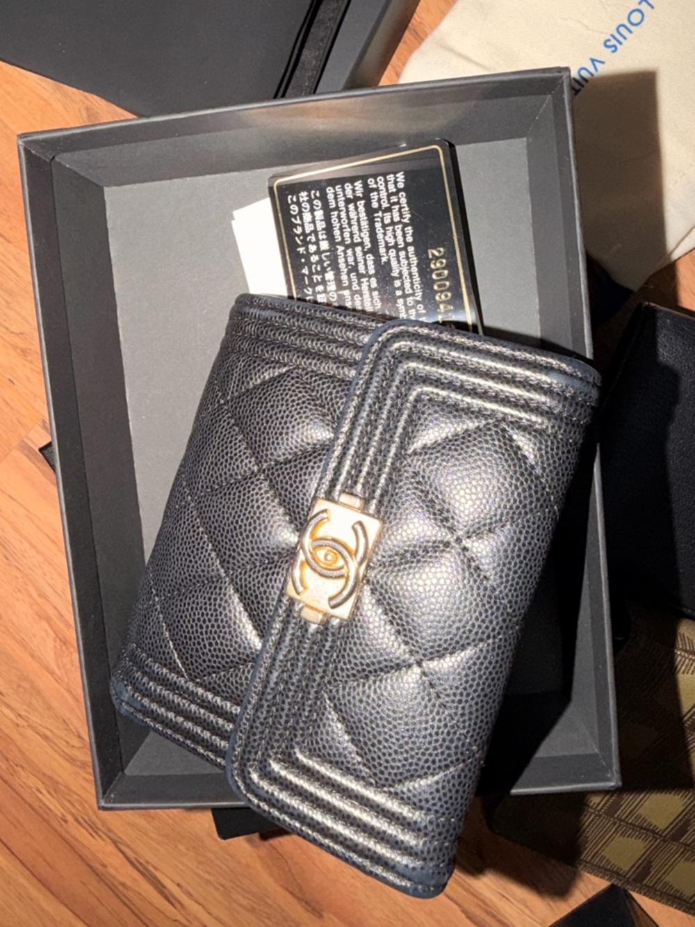 CHANEL Black Quilted Caviar Leather Boy-style Wallet with Gold CC Closure